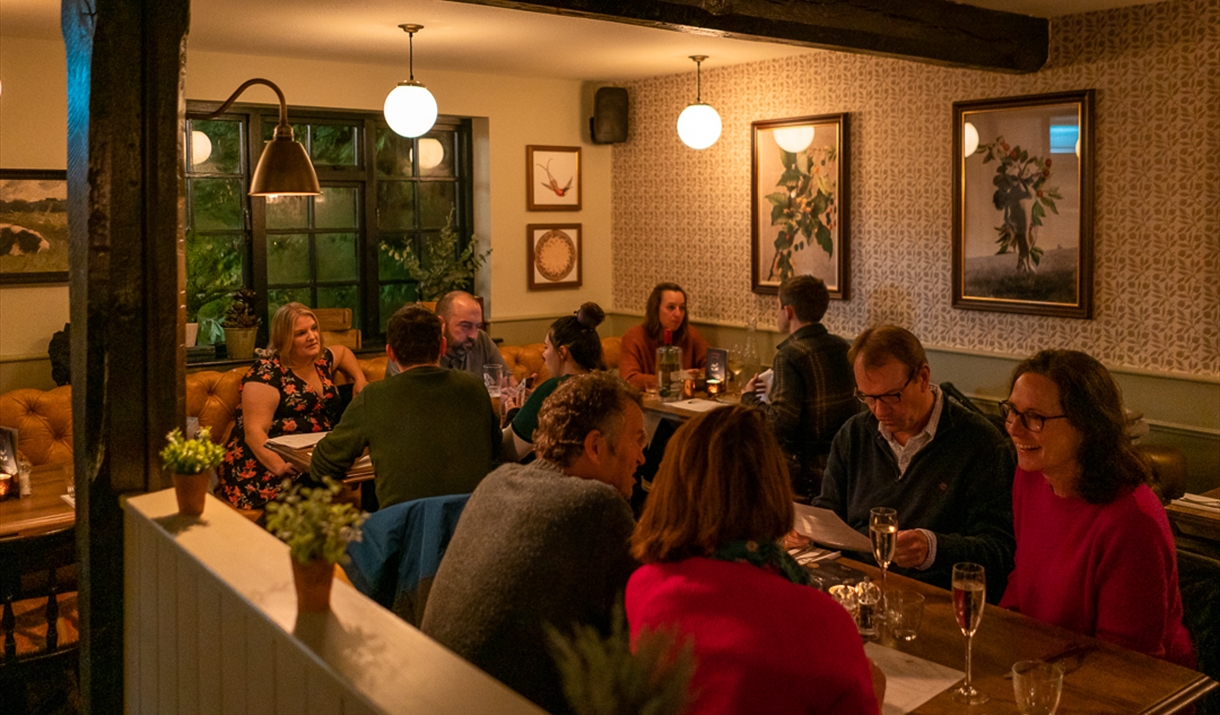 People sat inside the bar at Ring o’ Bells
