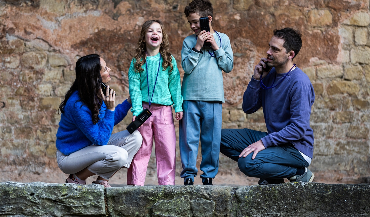 family with audioguides