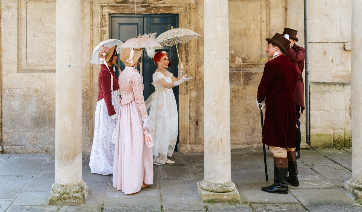 A group of people wearing Regency costume