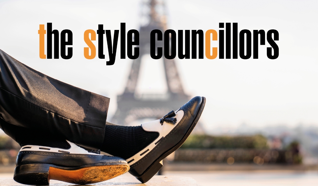 A photo of a a pair of legs in a pair of smart black trousers and shoes