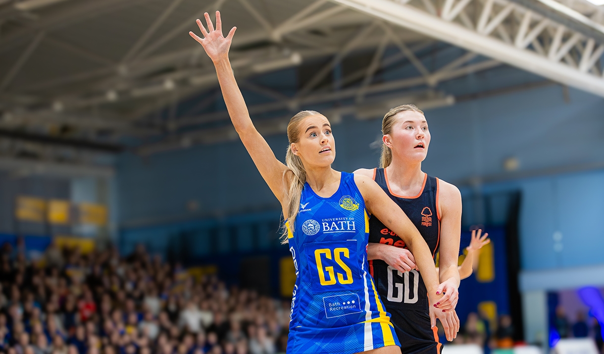Team Bath Netball player Katherine Mansfield signals for a pass while under pressure from a Nottingham Forest defender