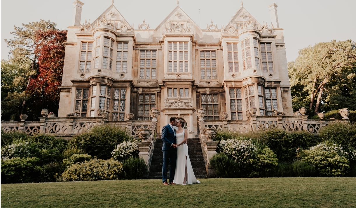 The married couple in front of the Hall