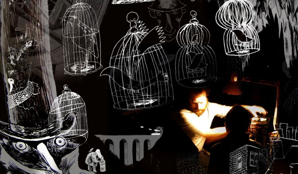 Man in dark room, lit by a warm spotlight from the right, with drawings of birds in cages surronding him.