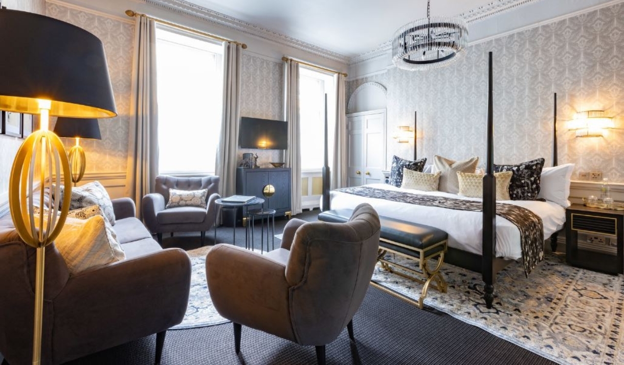 A bedroom inside of the Poster Suites at The Queensberry Hotel in Bath