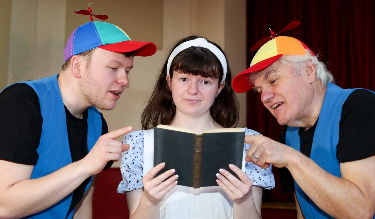 Actors from Hedgehog Theatre Company playing Alice, Tweedle-Dee and Tweedle-Dum