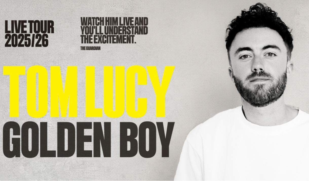 A poster advertising the show 'Tom Lucy: Golden Boy' at Komedia Bath