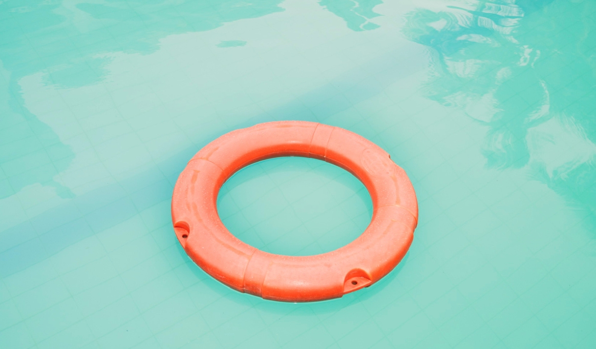 Orange rubber ring in pool