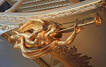 Gold baroque angel sculpture