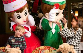 Two children having festive fun.
