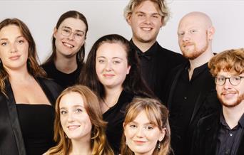 The Apex Singers all smiling