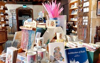 Bookmarks, pens, mugs, and books