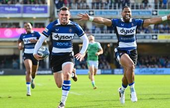 Men playing rugby