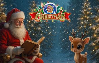 Santa Claus sits in a golden chair reading a book in a snowy, decorated forest, while a cute reindeer calf stands nearby. The Avon Valley Christmas lo