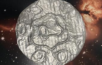 Image of a homemade moon using tinfoil