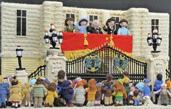 A knitted scene of the Royal Party on the balcony of Buckingham Palace, celebrating VE Day