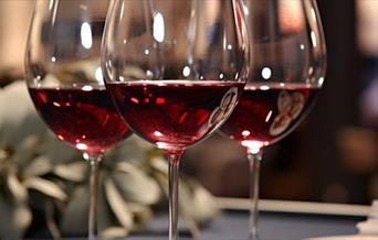 Three glasses of red wine