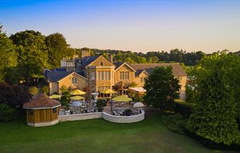 Exterior of the Homewood Hotel in Somerset at sunset