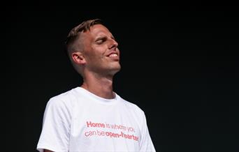 A photo of world Poetry Slam Champion Harry Baker