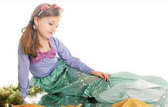 child dressed up as Mermaid