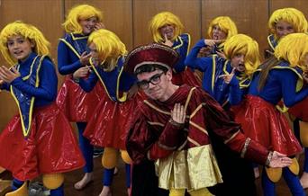 child dressed as Lord Farquade from Shrek