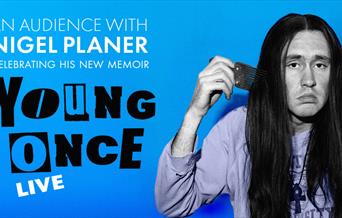 Nigel Planer combing his hair