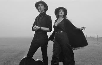 black and white photo of two cowboys