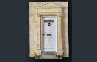 A scale model of a doorway on a Georgian-era building