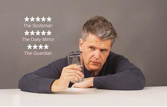 Photo of comedian Trevor Lock with 4 and 5 star media reviews