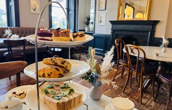 Interior of the Tea Bar and a table set up for afternoon tea