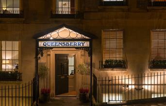 Exterior of The Queensberry Hotel in Bath by night