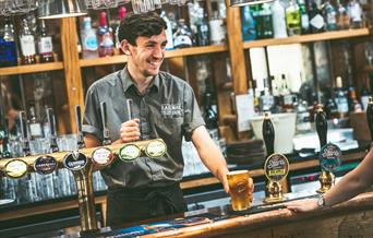 Barman serving drinks