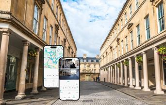 Phones displaying the tour app and a background of the city of Bath