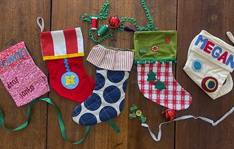Image of 5 colourful, handmade Christmas stockings