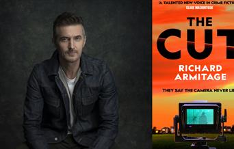 Richard Armitage next to his book