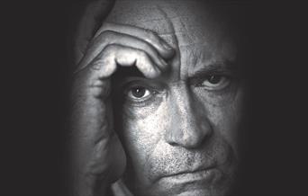 Man with head in hands