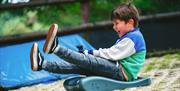 Child enjoying dry slope