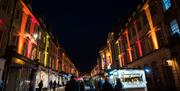 Bath Christmas Market stalls along Milsom Street 
