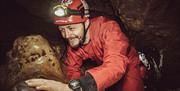Person caving in the Mendips