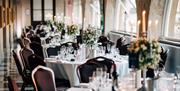 A set of tables for a wedding reception at The Roman Baths
