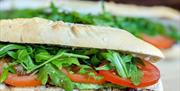 Sandwich with rocket and tomato