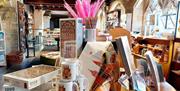 Mugs, puzzles, feather pens, and more