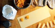 Italian cooking course in action, making a pasta