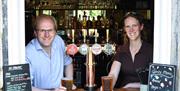 Staff behind the bar at Cross Guns at Avoncliffe
