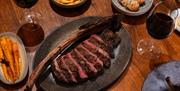 Sharing steak at The Bird Grill
