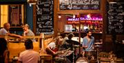 A band performing in a restaurant