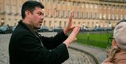Jules discussing the Royal Crescent with people on a tour