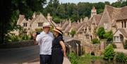 Couple stood in pretty village