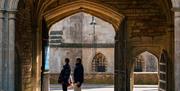 People stood in historic courtyard