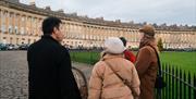 Jules discussing the Royal Crescent with a tour group