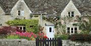 Exterior of a house in Bibury in the Mad Max Cotswold Tour.